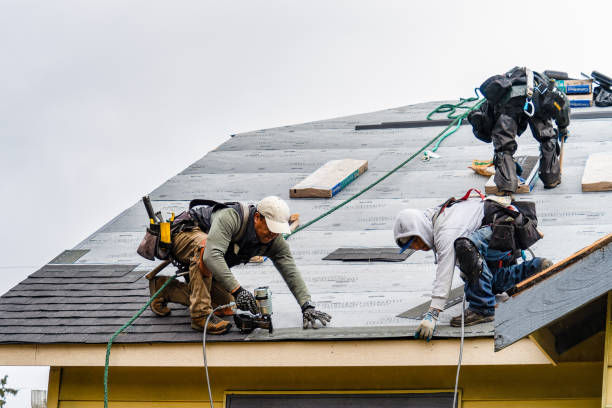 Professional Roofing technician working in Providence, RI